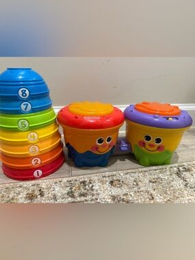 Fisher-Price bundle of Bright Multi-Color Stacking Drums - Orange & Red